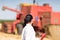 Woman agronomist in wheat field