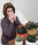Woman with allergic rhinitis from indoor plants
