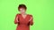 Woman is angry with her boyfriend, she screams and gestures telling him to leave. Green screen