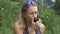 Woman anxiously talking to a portable radio