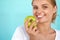 Woman With Apple. Beautiful Girl With White Smile, Healthy Teeth