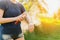 Woman applying insect repellent before forest hike beautiful sum