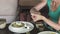 Woman applying sanitizer gel onto her hand before eating for protection against infectious virus, bacteria and germs