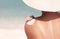 Woman applying sunscreen creme on  tanned  shoulder. Skincare. Body Sun protection suncream. Bikini hat woman applying moisturizin