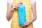 Woman in apron in hands domestic toilet detergent household chemicals