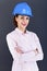 Woman architect, contractor in blue helmet
