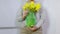 Woman arranges bouquet of daffodils