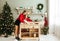 Woman arranging table for Christmas