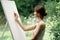 woman artist nature easel drawing creative landscape