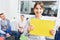 Woman as trainee with blank sign