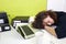 Woman asleep at her desk