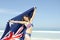 woman Australian flag at beach