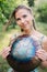 Woman with authentic drum musical instrument