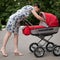 Woman with baby carriage