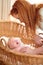 Woman, baby and home bedroom with morning nap, tired yawn and parent love in nursery. Newborn, mother and mama care with