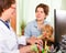 Woman with baby listening friendly pediatrician doctor