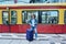 Woman with backpack suitcase at railway station