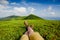 Woman backpacker enjoy the view on summer mountains