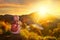 Woman with backpacker enjoying sunrise view at high mountains.