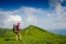 Woman backpacker in the mountains enjoy the view