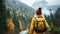 Woman Backpacker Observing Majestic Mountain Landscape