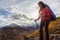 Woman Backpacking in Scenic Mountain Landscape