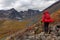 Woman Backpacking on Scenic Rocky Hiking Trail