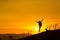 Woman backpacking to watch the sunset.Silhouette,Jumping glad