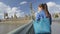 Woman With Bag Walking On Westminster Bridge In London England