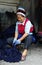 A woman of Bai ethnic minority making batik