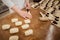 Woman baker make buns with fruit filling from dough