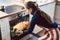 Woman baking apple pie at home