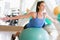 Woman Balancing On Swiss Ball