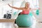 Woman Balancing On Swiss Ball