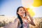 Woman with balloons taking selfie