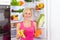 Woman banana orange refrigerator