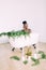 Woman bathing in a tub full of foam. Beautiful african american bride in decorated bath