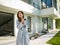 Woman in a bathrobe enjoying morning coffee