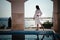 woman in bathrobe at pool