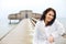 Woman in Bathrobe Relaxing on the Beach