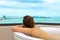 Woman in bathtub relaxing sea view background