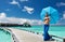 Woman on a beach jetty at Maldives