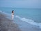 woman on the beach walk rocky mountains landscape nature