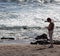 Woman beachcomb on Glass Beach