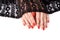 Woman beautiful hands with red manicure and black lace on white background