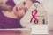 Woman on bed, world breast cancer day on calendar