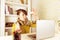 Woman being playful at work, looking at healthy snack