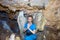 Woman in a Bellamar cave near the stalactite angel wings. Matanzas, Cuba