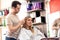 Woman at beuty salon doing hair color treatment