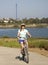 A Woman Bikes Fiesta Island, Mission Bay, San Diego